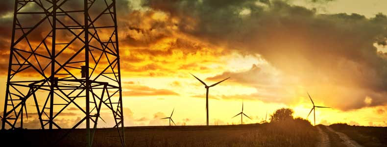 windmills-field-power-tower windmills on the plains at sunset